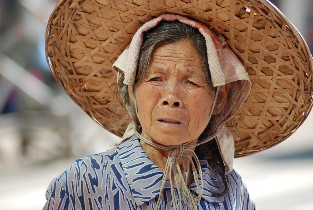 woman on street, xiaoyi county, guangxi woman on street, xiaoyi county, guangxi